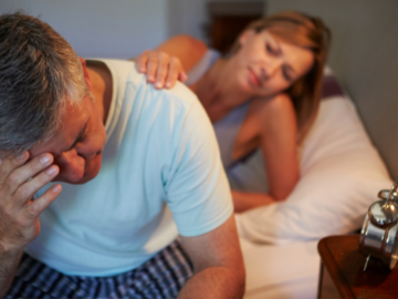 Woman comforting husband